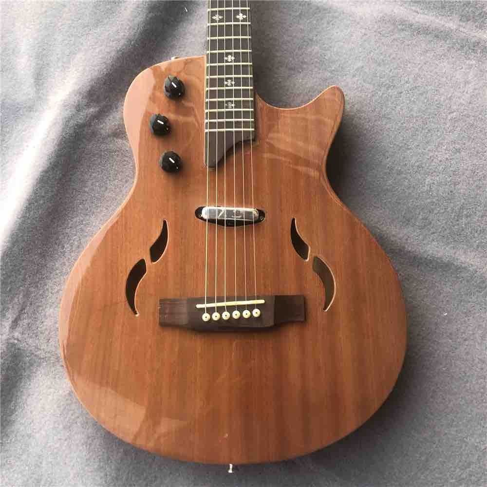 Taylors raw wood electric guitar