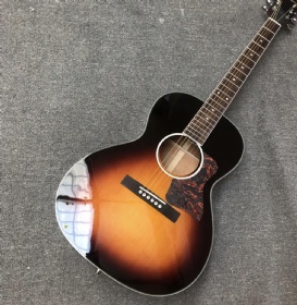 Custom OO body solid spruce top rosewood fingerboard and bridge 39 inch acoustic guitar